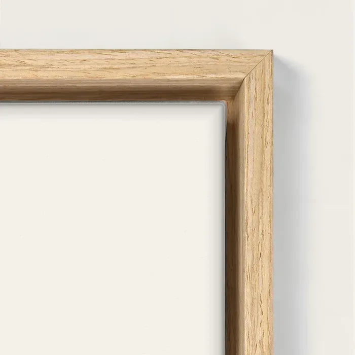 Light oak float frame, corner, on a stretched canvas